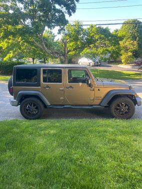 Gold 2015 Jeep Wrangler Unlimited Sport
