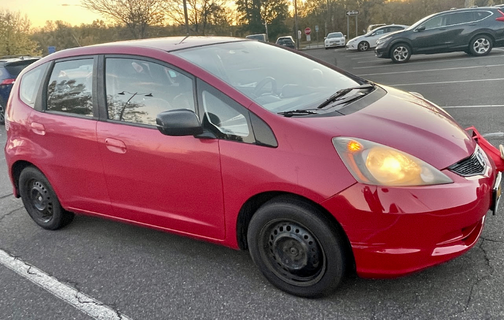 Red 2010 Honda Fit Base
