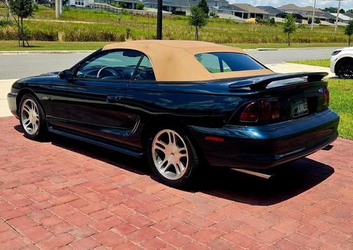 Green 1997 Ford Mustang GT