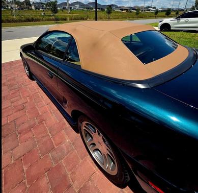 Green 1997 Ford Mustang GT