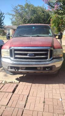 Red 2002 Ford F-250 Lariat Crew Cab Super Duty