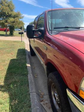 Red 2002 Ford F-250 Lariat Crew Cab Super Duty