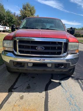Red 2002 Ford F-250 Lariat Crew Cab Super Duty