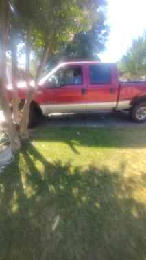 Red 2002 Ford F-250 Lariat Crew Cab Super Duty