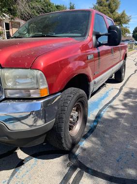 Red 2002 Ford F-250 Lariat Crew Cab Super Duty