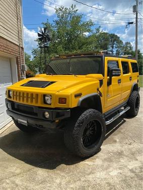 Yellow 2006 Hummer H2 Base