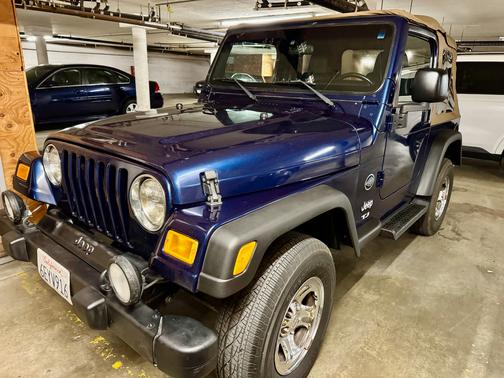 Blue 2003 Jeep Wrangler Sport
