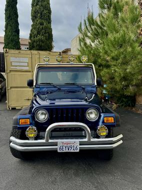 Blue 2003 Jeep Wrangler Sport