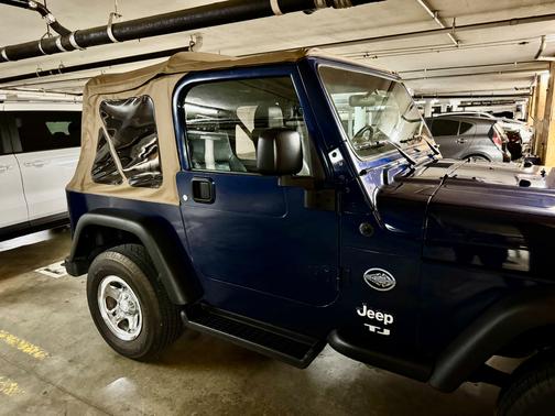 Blue 2003 Jeep Wrangler Sport