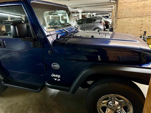 Blue 2003 Jeep Wrangler Sport