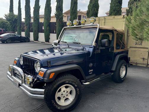 Blue 2003 Jeep Wrangler Sport