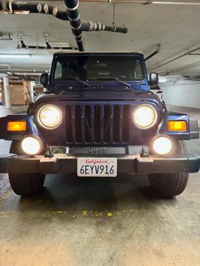 Blue 2003 Jeep Wrangler Sport