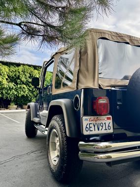 Blue 2003 Jeep Wrangler Sport