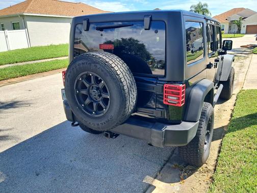 Black 2016 Jeep Wrangler Unlimited Sport