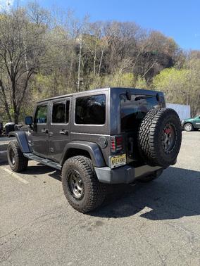 Gray 2018 Jeep Wrangler JK Unlimited Sahara