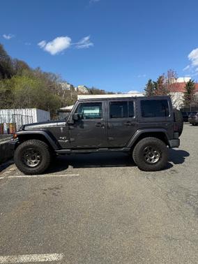 Gray 2018 Jeep Wrangler JK Unlimited Sahara