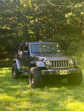 Gray 2018 Jeep Wrangler JK Unlimited Sahara