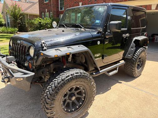 Black 2012 Jeep Wrangler Sahara