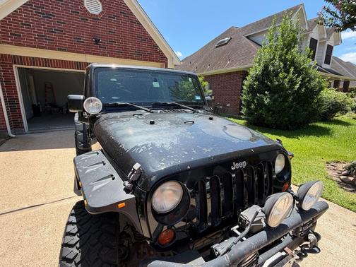 Black 2012 Jeep Wrangler Sahara