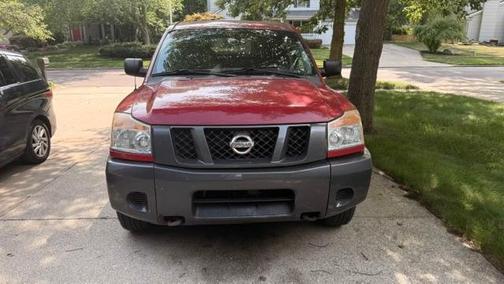 Red 2008 Nissan Titan XE