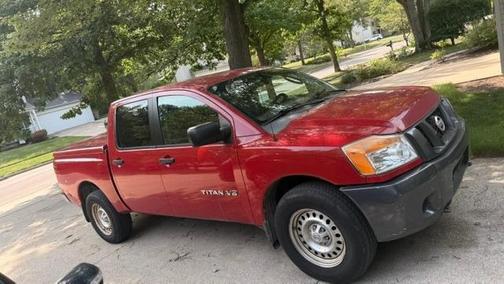 Red 2008 Nissan Titan XE