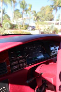 Red 1992 Cadillac Seville STS
