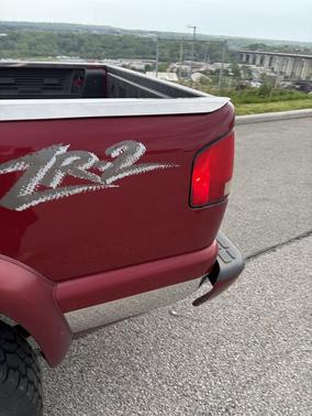 Red 2000 Chevrolet S-10 LS Extended Cab