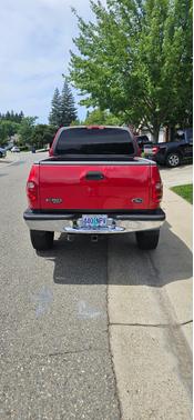 Red 2001 Ford F-150 XL SuperCab Flareside