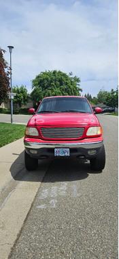 Red 2001 Ford F-150 XL SuperCab Flareside