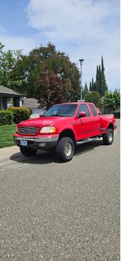 Red 2001 Ford F-150 XL SuperCab Flareside