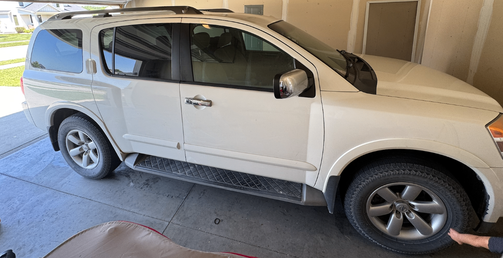 White 2012 Nissan Armada SV