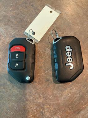 Red 2019 Jeep Wrangler Unlimited Sport S