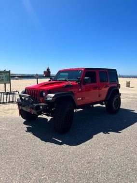 Red 2019 Jeep Wrangler Unlimited Sport S
