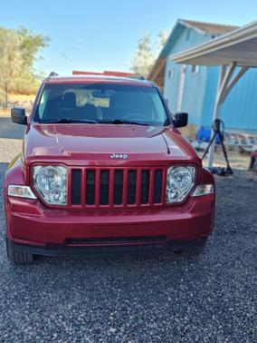 Red 2012 Jeep Liberty Sport