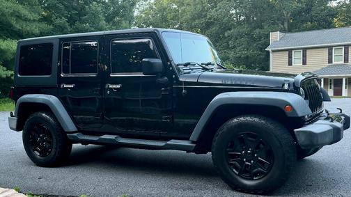 Black 2016 Jeep Wrangler Unlimited Willys Wheeler