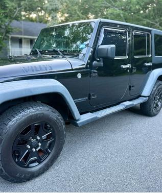 Black 2016 Jeep Wrangler Unlimited Willys Wheeler