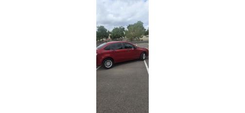 Red 2009 Ford Focus SE