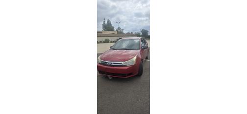 Red 2009 Ford Focus SE