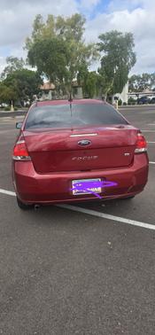 Red 2009 Ford Focus SE