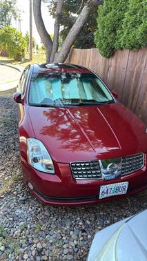 Red 2005 Nissan Maxima SE