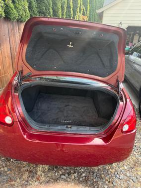 Red 2005 Nissan Maxima SE