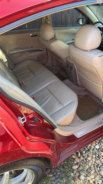 Red 2005 Nissan Maxima SE
