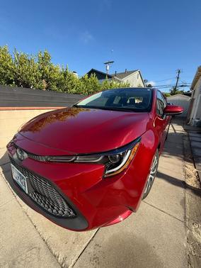 Red 2022 Toyota Corolla Hybrid LE