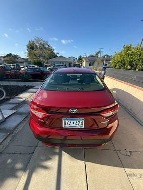 Red 2022 Toyota Corolla Hybrid LE