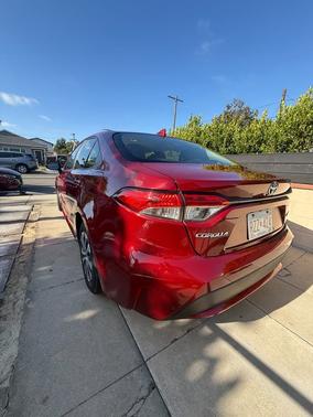 Red 2022 Toyota Corolla Hybrid LE