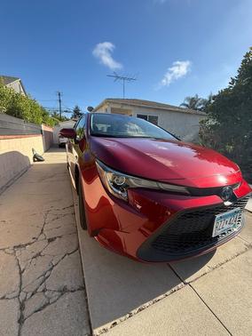 Red 2022 Toyota Corolla Hybrid LE