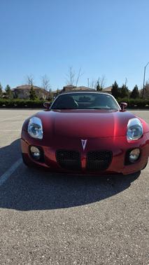 Red 2009 Pontiac Solstice GXP