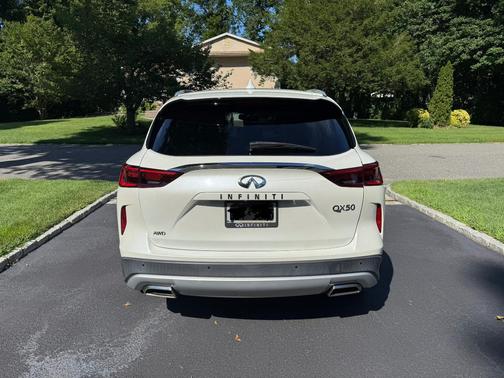 White 2019 INFINITI QX50 ESSENTIAL