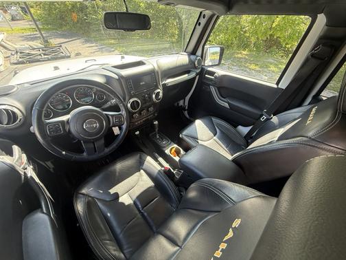 White 2015 Jeep Wrangler Unlimited Sahara