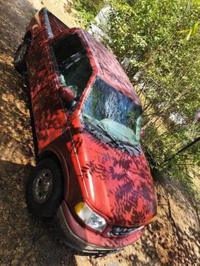 Red 2002 Ford F-150 Lariat SuperCrew